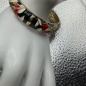 Gold Tone With White Red And Black Enamel Floral
Clamper Bangle Bracelet